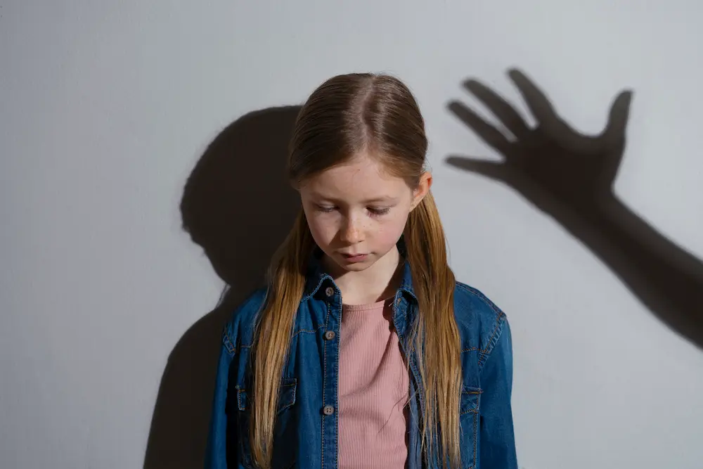 medium-shot-girl-being-abused-portrait